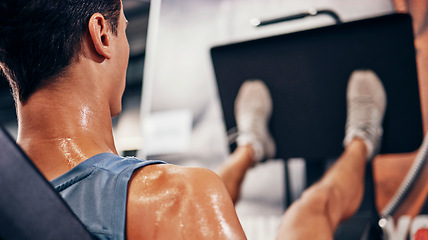 Image showing Fitness, man sweating using leg press for workout, health and wellness, strong muscle and cardio in gym. Exercise motivation, body and weight training with sports and active, healthy lifestyle.