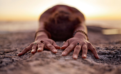 Image showing Yoga, pilates and beach hands with zen of a woman on ocean sand for chakra and wellness meditation. Training, exercise and spiritual mindset of a athlete at sunset and nature in Miami stretching