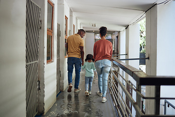 Image showing Black family, children and animal shelter with a girl, mother and father walking together on a balcony. Kids, volunteer and charity with a man, woman and daughter holding hands at a rescue center