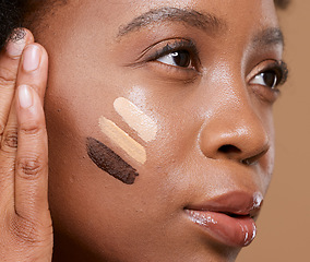 Image showing Beauty, makeup and foundation shades on face of black woman with swatch for cosmetics, diversity or base tone. Visage, product and glamour with different color on girl model for concealer or textures