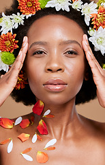 Image showing Flower, crown and portrait of woman in studio for beauty, skincare and nature product on brown background. Face, flower and black woman relax with glowing skin, facial and wellness floral aesthetic