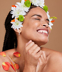 Image showing Beauty, skincare and flowers in hair of black woman for self love, natural and spring season. Luxury, happy and fresh with girl model and petals for style, fashion and creative in studio background