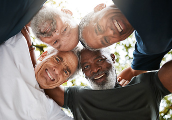 Image showing Old men, huddle and diversity, friends and teamwork outdoors for solidarity, unity or union in low angle. Support, trust and collaboration of happy and senior fitness group together on workout break.