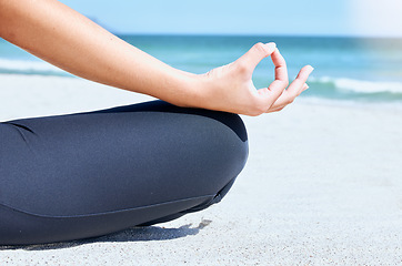 Image showing Yoga, meditation and beach fitness hand of a woman with beach zen, chakra and relax exercise. Peace, mindfulness balance and training pilates hands for meditate, ocean sand and spiritual healing