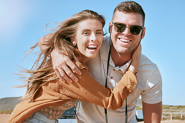 Image showing Love, hug and portrait of a happy couple on road trip, vacation or adventure for summer. Happiness, fun and young man and woman embracing while on an outdoor journey or holiday together in Australia.