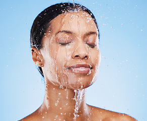 Image showing Beauty, skincare and shower with black woman and water splash for cleaning, hydration and natural cosmetics. Moisture, fresh and relax with face of girl model for product, self care and luxury