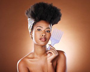 Image showing Beauty, hair and afro with black woman and comb for salon, luxury and natural style. African, self love and scarf with portrait of girl model for wellness, grooming and shampoo in studio background