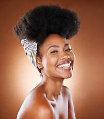 Image showing Black woman, afro hair and skincare glow on studio background in healthcare wellness, face dermatology or cosmetology. Portrait, smile or happy beauty model with natural hair, head scarf and makeup