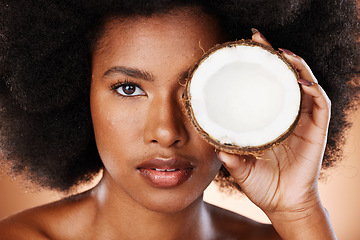 Image showing Beauty, skincare and black woman with coconut for a cosmetic healthcare product, healthy skin treatment and natural wellness. Organic health portrait, clean diet and self care nutrition studio mockup