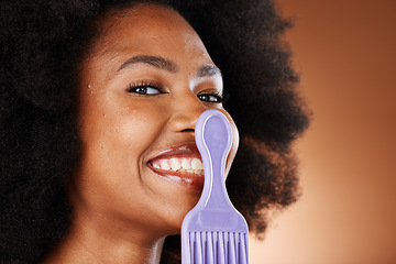 Image showing Natural hair, hair care and black woman with comb, beauty portrait with cosmetic advertising against studio background, Makeup, hair styling and natural cosmetics with face mockup and treatment.