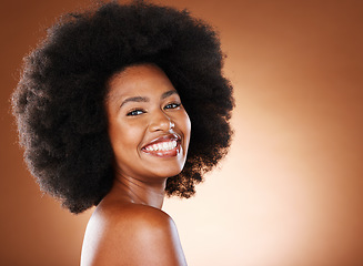 Image showing Portrait of black woman, beauty and hair care model with cosmetics hairstyle, afro empowerment and happy Nigeria model. Face of happy, proud African girl and healthy skincare glow in a studio