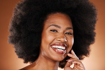 Image showing Black woman in beauty, makeup and face with hair care portrait, natural hair and cosmetics with afro against studio background. Cosmetic, clean and glow with healthy skin and facial treatment.