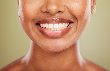 Image showing Smile, teeth and mouth of black woman closeup on studio background for dental care or cosmetics. Health, wellness and happy woman with cleaning routine for oral wellbeing and healthy teeth whitening