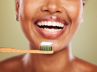 Image showing Black woman, wooden toothbrush or teeth closeup for dental health, mouth or beauty. Woman, eco friendly or self care model with teeth whitening toothpaste, happy or studio zoom for bamboo cleaning