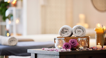 Image showing Relax, peace and calm at a luxury spa for wellness, health and zen during a massage. Candles, flowers and healing environment at a salon for stress relief, relaxation and physical therapy on vacation