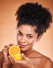 Image showing Lemon, skincare and black woman with food to detox against a brown studio background. Marketing, vitamin c and portrait of an African model advertising fruit for natural beauty, skin and nutrition