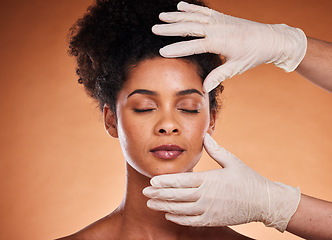 Image showing Plastic surgery, cosmetics and black woman in studio with medical hands for botox, aesthetic or facial dermatology help, support and trust. Mesotherapy, hyaluronic acid or collagen of girl model face