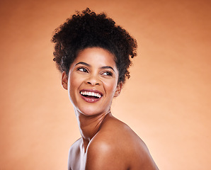 Image showing Skincare, wellness and happy black woman in studio for cosmetic, natural and healthy face routine. Happiness, beauty and young African model with health facial or skin treatment by orange background.