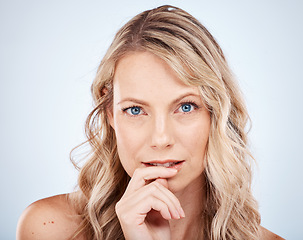 Image showing Woman, hair and portrait of blonde woman for beauty, haircare and growth on a white studio background. Keratin treatment, colour and bleach blond female with wavy hairstyle in a hairsalon spa.