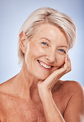 Image showing Portrait, cosmetics and senior woman with natural beauty, skincare and wellness for health on blue studio background. Makeup, mature lady or elderly female with smile, face detox and smooth skin care