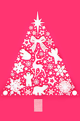 Image showing Christmas Tree Concept Shape with Snowflakes and White Ornaments