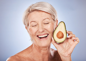 Image showing Beauty, skincare and elderly woman with avocado cosmetics smile for organic skin health, natural detox and luxury spa mockup. Portrait of happy senior, wellness treatment and healthy diet in a studio