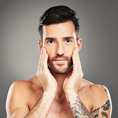 Image showing Skincare, beauty and portrait of a man with face for cosmetics against a grey studio background. Wellness, body and a young cosmetic model with care and health of skin and beard with dermatology