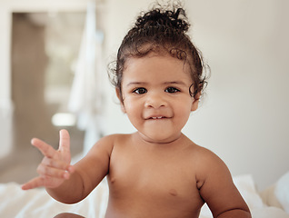 Image showing Baby, rock and roll hand sign, portrait in bed, morning and happy, cool kid with rocker expression in house. Girl child play in bedroom, smile and have fun while relax, cute and sitting in home