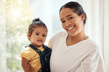 Image showing Love, mother holding girl and portrait being happy, bonding and loving together to relax. Motherhood, mama and daughter have quality time, happiness and carry child with care and a smile