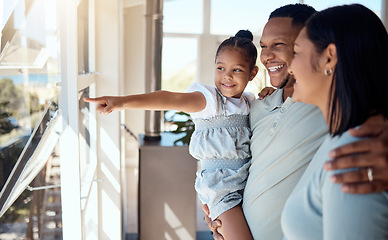 Image showing Family, children and animal shelter with a mother, father and daughter at a rescue center for adoption. Love, charity and pointing with a man, woman and girl bonding as social or volunteer staff