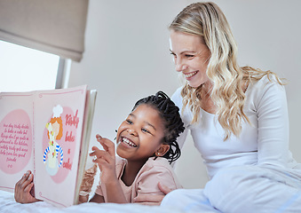 Image showing Mother, child and reading book for learning with fun and education, happy with kids story in bedroom at home. Woman, girl and read for development and storytelling, relax with reading and book.