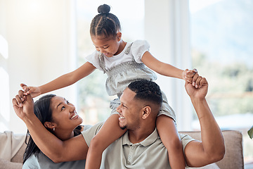 Image showing Family, love and children with a mother, father and daughter bonding or playing on a sofa in the living room of their home. Kids, happy and smile with a man, woman and girl spending time together