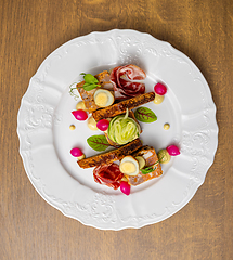 Image showing Gourmet dish, beautifully presented on a white plate