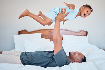 Image showing Happy, airplane and father with child in bedroom for relax, support and bonding together. Smile, balance and games with dad playing with son in family home for freedom, funny and affectionate