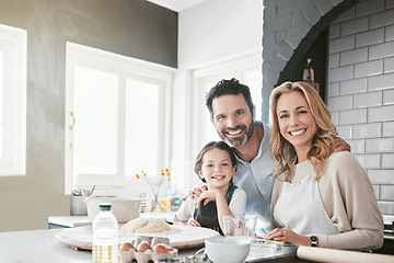 Image showing .Family, children and baking with a mother, girl and father in the kitchen of their home together for cooking. Food, kids and love with a woman, man and daughter learning how to bake while bonding.