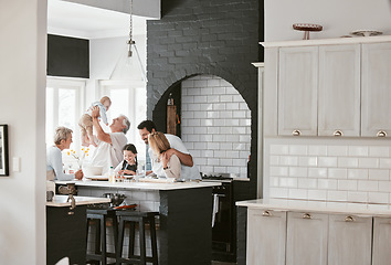 Image showing Baking, happy and big family bonding in kitchen for food with conversation in a house. Cooking, communication and children with parents and grandparents for breakfast, lunch or dinner in family home