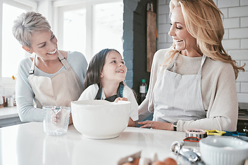 Image showing .Child, grandmother and mom teaching cooking together in kitchen bonding, quality time or fun activity at home. Happy mother, grandma and excited kid chef learning to bake cake with family support.