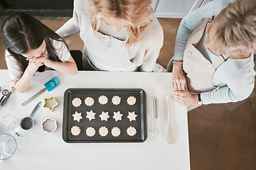 Image showing Baking, learning and cookies with family on kitchen counter with girl, mother and grandmother in home from top view. Child, mom or grandma bonding, bake or family home lifestyle, food and ingredients