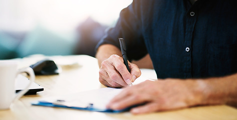 Image showing Notes, planning and hands of businessman writing on paper, documents and form in house. Administration, paperwork and remote employee working and giving signature on a contract for entrepreneur work