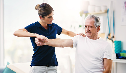 Image showing Physiotherapist, senior man and patient stretching, health and wellness in office. Healthcare, mature male client and female medical professional help with injury, exercise and physiotherapy fitness.