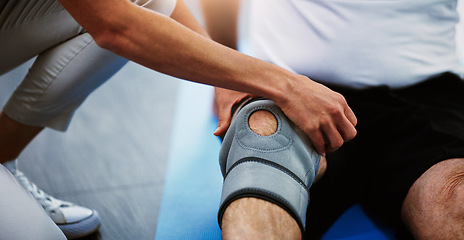 Image showing Physiotherapist hands, knee brace and man with injury, pain and torn muscle. Physiotherapy, male patient and female medical professional help, consulting and rehabilitation for leg and healthcare.