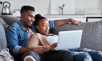 Image showing Black couple, laptop and living room sofa to relax while streaming movies, video or film with 5g network connection or home wifi. Man and woman on social media, reading news or doing online shopping