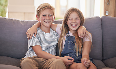 Image showing Family, children and sister and brother relax on a sofa, happy and laughing in their home together. Portrait, kids and siblings bond in a living room, sharing joke and close relationship in Amsterdam