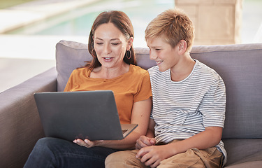 Image showing Mother, son and laptop watching movie, online and subscription, relax and happy on sofa together in home. Mom, boy and bonding, social media and fun while browsing internet and funny meme or post