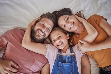 Image showing Family, portrait and relax in bed by girl and parents resting from above, happy and smile in home together. Happy family, love and face of child with mom and dad in bedroom for bond and hug