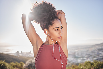 Image showing Fitness, stretching and black woman with headphones in city for warm up to start running. Wellness, health and girl doing workout, stretch and exercise on mountain listening to music, track and audio