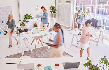 Image showing Office diversity, walking and busy women working on woman empowerment advertising research in marketing agency. Coworking group, startup small business and fast moving team planning campaign schedule