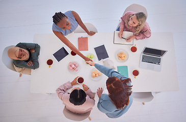 Image showing Business meeting women, top view and shaking hands, diversity partnership and hiring, consulting and management agreement, deal and goals. Handshake, welcome and teamwork support, trust and thank you