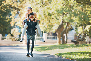 Image showing Fitness, piggyback and couple doing workout in nature together for health, wellness and exercise. Happy, energy and interracial man and woman doing sports training while having fun in a green garden.