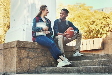 Image showing Students, friends and talking or bonding on university campus outside for knowledge and education. Woman, man and college student people conversation about schoolwork and sport or football